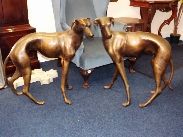 A 20thC. pair of bronze lurchers £700