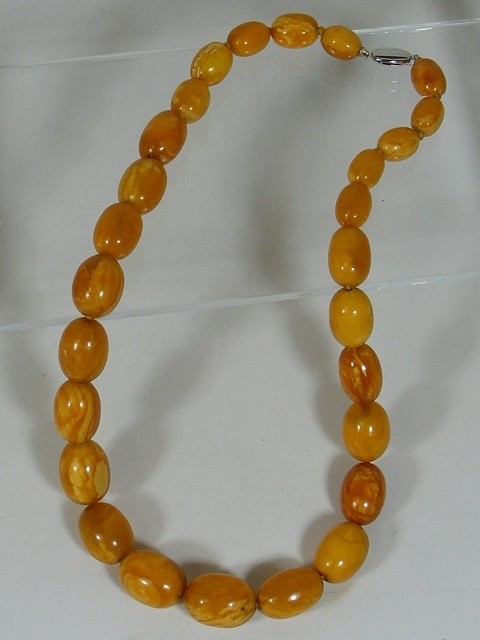 A 19thC. set of amber beads SOLD £2100