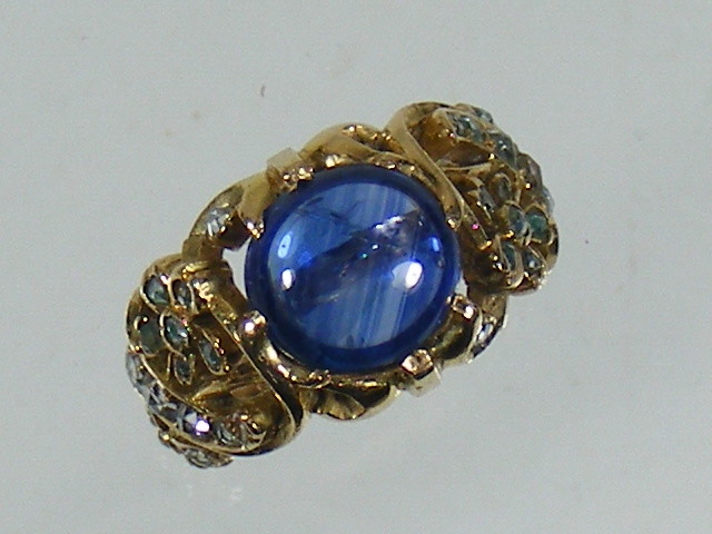 A 14ct gold sapphire ring SOLD £440