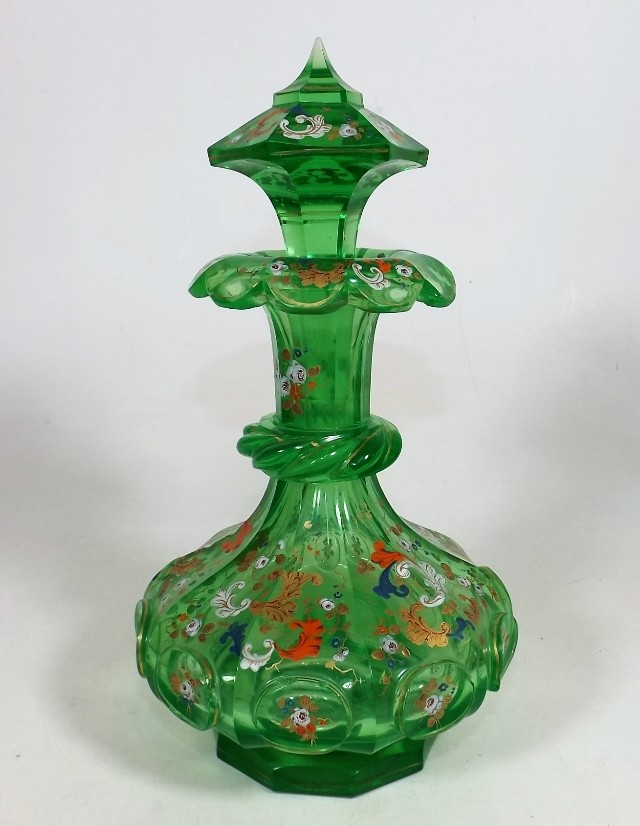 A 19thC. Bohemian glass decanter, damaged SOLD £500