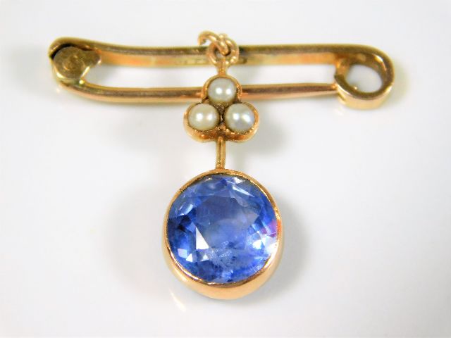 A Ceylon sapphire pendant later mounted on brooch SOLD £920