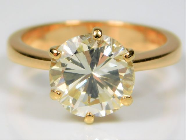 An 18ct gold diamond solitaire ring set with 3.9ct diamond SOLD £10000