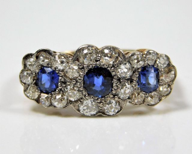 An Edwardian sapphire ring set with small diamonds SOLD £900