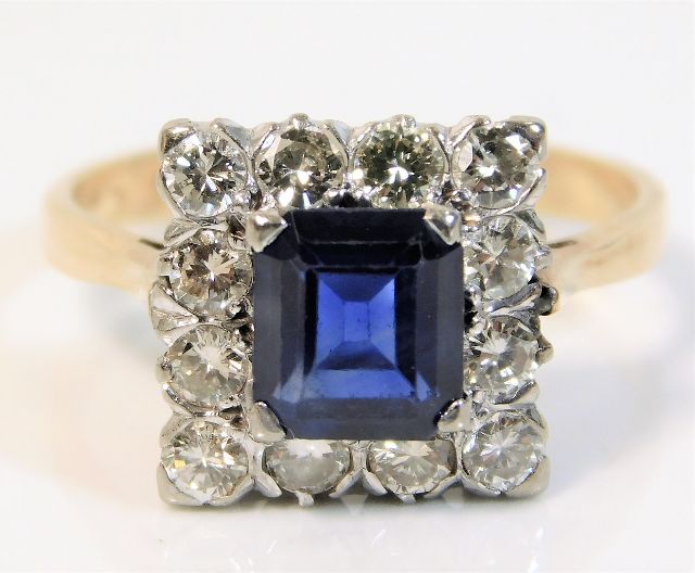 A 14ct gold diamond & sapphire ring SOLD £660