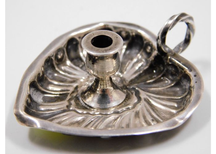 A 19thC. novelty London silver miniature chamberstick candle holder by William Comyns, date mark for 1896, approx. 8.5g SOLD £60