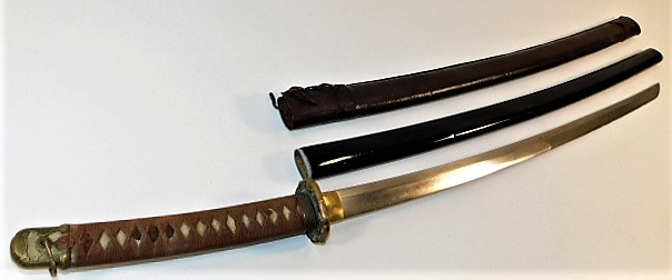 A Japanese WW2 samurai sword with scabbard & leather sleeve, sword length 36.5in SOLD £480