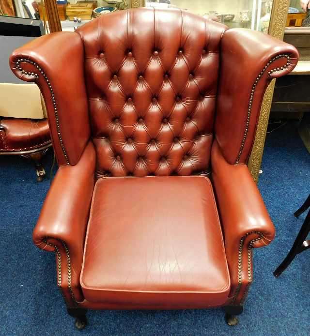A modern leather wing back Chesterfield chair SOLD £280