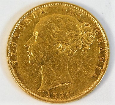 An 1864 Queen Victoria Young Head full gold sovereign £420