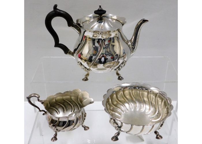 An 1894 Victorian three piece London silver bachelors tea set by Sibray Hall SOLD £280