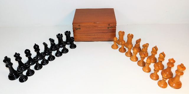 An antique weighted wooden Staunton chess set in original box, later relined, king size 4.25in, numerous faults, sold with vendors hand made chess board SOLD £440