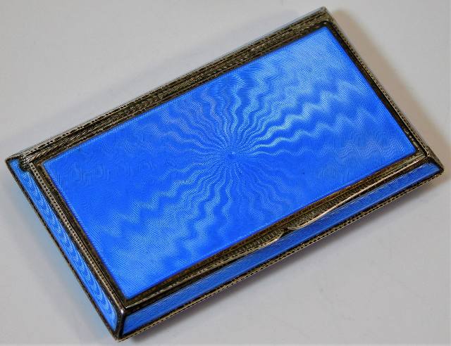 An enamelled silver cigarette case with gilt interior 3.25in x 1.75in 83g SOLD £420